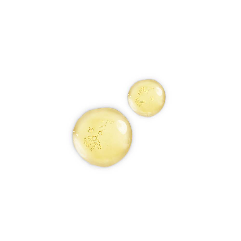 Two drops of a light-gold-coloured facial oil.