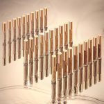 A collection of creamy concealers with a radiant, glowy finish in glass tubes with gold-coloured lids for skin tones of all types.