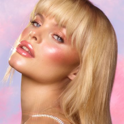 Model wearing Glowgasm Face Palette Lightgasm