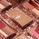 Hollywood Blush & Glow Glide Palette in Tan-Deep with a sparkle background