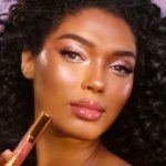 GLOSSY NUDE PINK LIP DUO ON MEDIUM SKIN TONE MODEL
