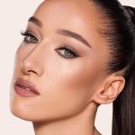 Bella Tilbury wearing Super Nudes collection