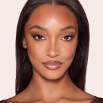 Model wearing The Super Nudes Collection