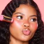 Model wearing Rosy Glow for a rose petal blush look