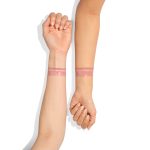 Pillow Talk Fair Lip Cheat + Collagen Lip Bath Arm Swatch