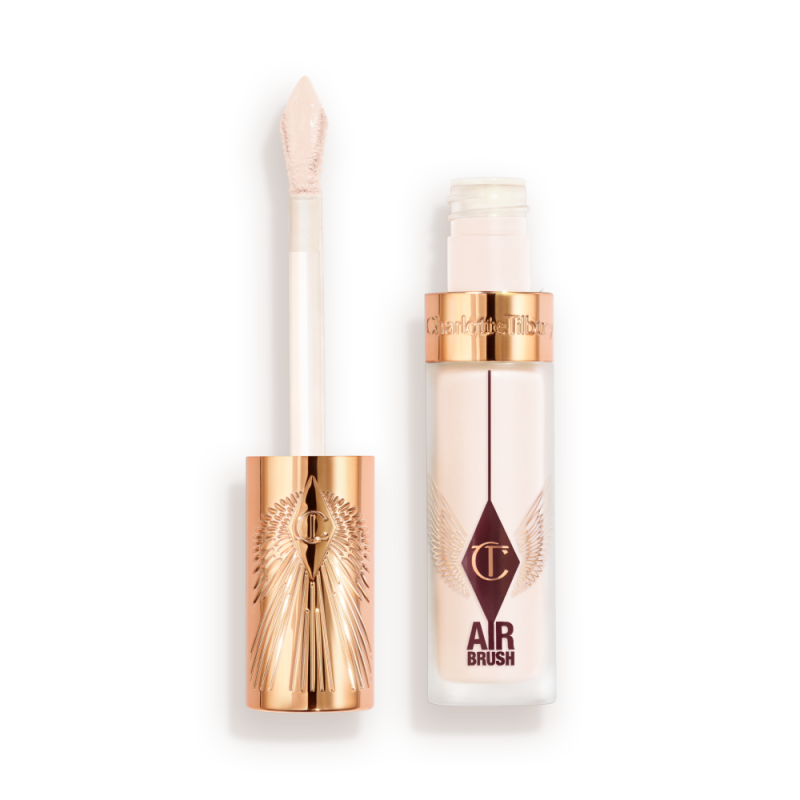 Charlotte Tilbury Airbrush Flawless Concealer with rose-gold cap and doe-foot applicator, shown with the lid off and product visible in a frosted tube.