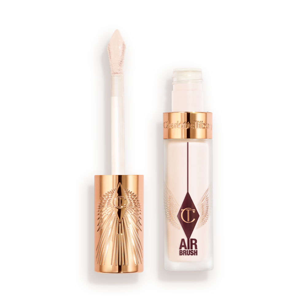 AFF_Concealer-Shade1-Open Charlotte Tilbury Airbrush Flawless Concealer with rose-gold cap and doe-foot applicator, shown with the lid off and product visible in a frosted tube.