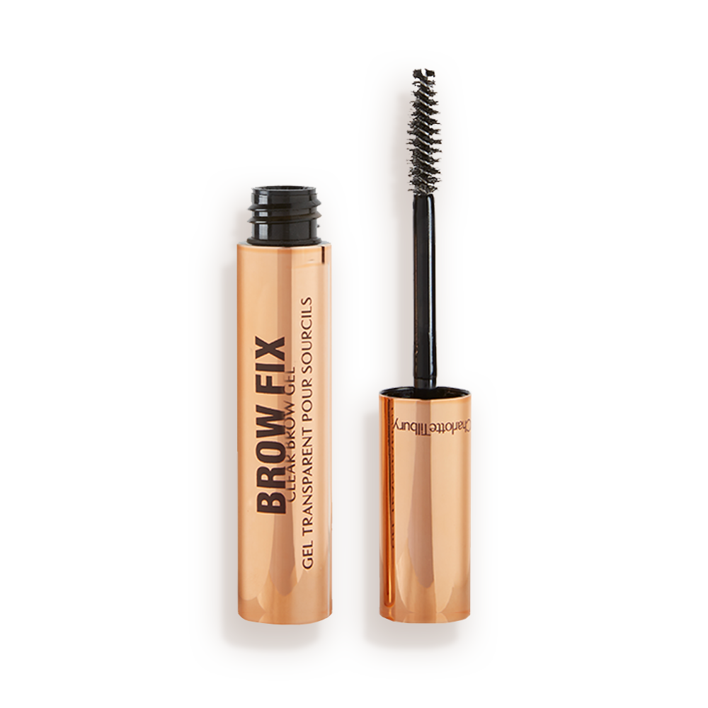 BROW-FIX_OPEN An open tube of clear, brow fixing gel with gold-coloured packaging.