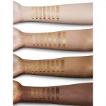 Fair, light, tan, and deep-tone arms with swatches of liquid foundations in thirty shades of fair, light, medium, medium-light, medium-dark, and deep-tone complexions.