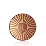 Closed bronzer compact with a golden and brown-coloured lid with the printed logo engraved in the middle.