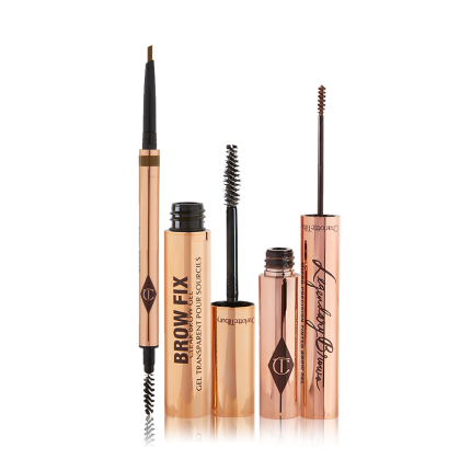 An open, double-ended eyebrow pen and brush, open eyebrow gel, and open eyebrow tint, all in gold-coloured tubes.