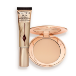 A foundation wand in gold packaging with a brown-beige-coloured body to show the shade of the foundation inside, and a pressed powder compact with a mirrored lid.