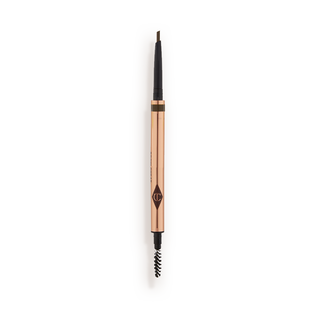 CHEAT_NaturalBrown_OPEN_BOTH_ENDS A double-ended eyebrow pencil and spoolie brush duo in a brown shade with gold-coloured packaging.