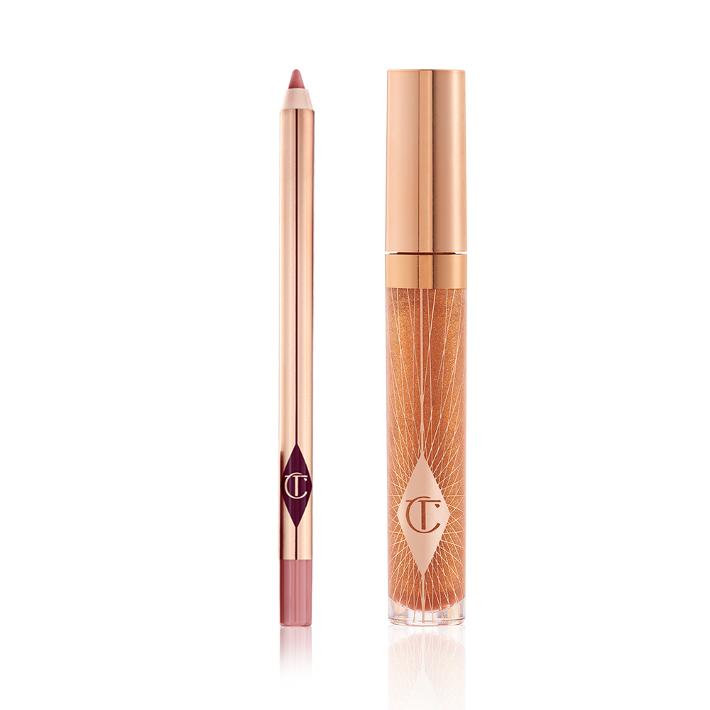 CLB-Lip-Duo-Packshot An open lip liner pencil in a nude pink shade and a closed, lip gloss in a sheer gold shade with a gold-coloured lid.
