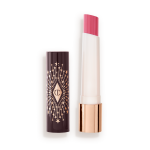 An open lipstick lip balm in a sheer nude pink berry shade, in white and gold tube with a black-coloured lid with gold sparkles all over it.