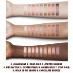 Fair, light, tan, and deep-tone arms with swatches of extremely pigmented cream eyeshadows with a metallic finish in shades of pink, gold, brown, peach, silver, purple, and bronze.