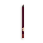 a berry-brown eyeliner pencil with its cap removed.