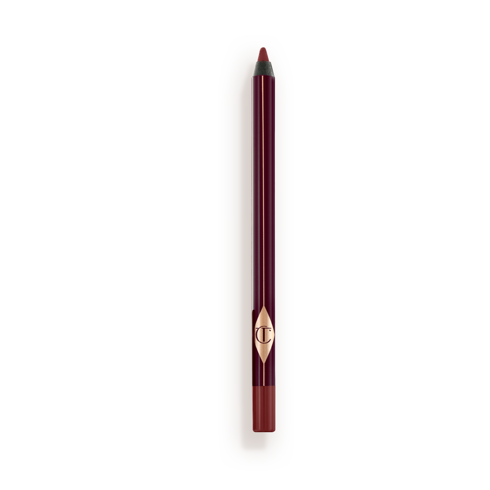 Eyeliner-Pillowtalk-Open-Packshot a berry-brown eyeliner pencil with its cap removed.