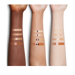 Fair, medium, and deep-tone arm swatches of four glow-boosting primer in light, medium-light, medium-dark, and deep shades.