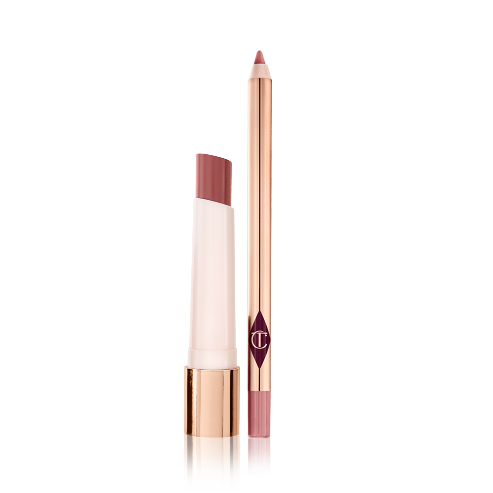 Happikiss-Bundle-2-Packshot An open, moisturising lipstick lip balm in a nude pink shade with an open lip liner pencil in nude pink.