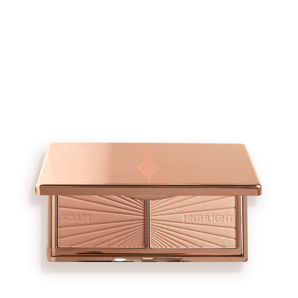 An open, mirrored-lid duo contour palette for light to medium skin tones in sleek rose-gold-coloured packaging.