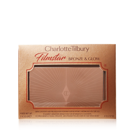 Gold-coloured box with a duo contour palette inside it with Charlotte Tilbury Filmstar bronze & glow written on top of the box.