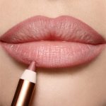 GLOSSY FRESH PINK LIP DUO CLOSE UP ON A FAIR MODEL
