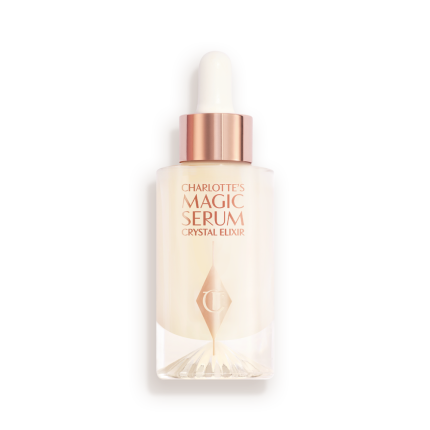 An award-winning, luminous, ivory-coloured serum in a glass bottle with a gold and white-coloured dropper lid.