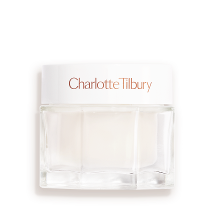 Clear jar with a white lid and white cream inside.