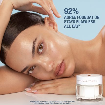 Medium skin tone model holding Magic Water Cream