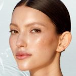 Model wearing Glow Toner and Take It All Off makeup remover