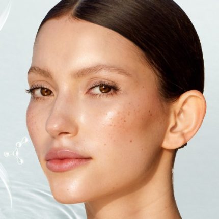 Model wearing Glow Toner and Take It All Off makeup remover