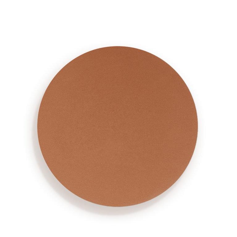 Swatch of a finely-milled bronzer in a chocolate brown shade, which is perfect for tan tones.