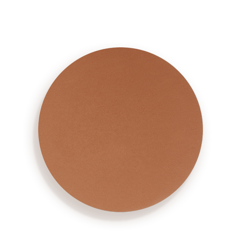 Swatch of a finely-milled bronzer in a chocolate brown shade, which is perfect for tan tones.