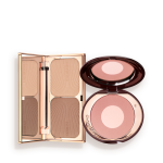 An open contouring and bronzing duo in a compact with a mirrored lid with an open, two-tone blush compact in a muted pink shade with a mirrored lid.
