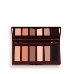 An open, mirrored-lid six-pan eyeshadow palette with matte eyeshadows in brown, peach, and beige shades.