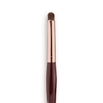 Close-up of an eyeshadow smudging brush with soft bristles and a rose-gold and dark crimson handle.