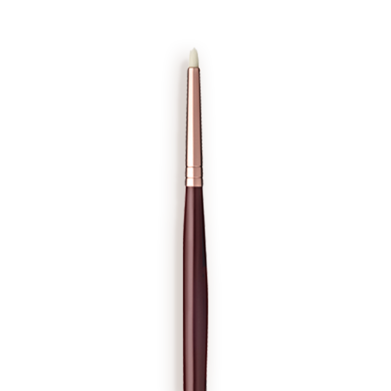 Close-up of an eyeliner brush with white-coloured brsitles with a rose-gold and dark crimson handle.