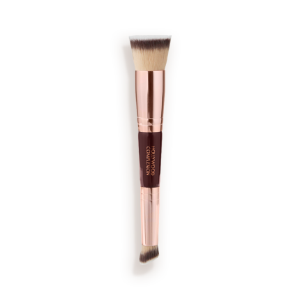 A double-ended contour brush with soft bristles and rose gold and dark crimson handle.