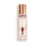 Charlotte Tilbury Airbrush Flawless Setting Spray bottle with a 'Best Seller' badge.