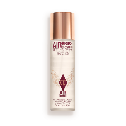 Charlotte Tilbury Airbrush Flawless Setting Spray bottle with a 'Best Seller' badge.
