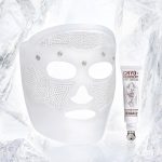 A textured, sheet mask with an eye serum in a white-coloured tube next to it.
